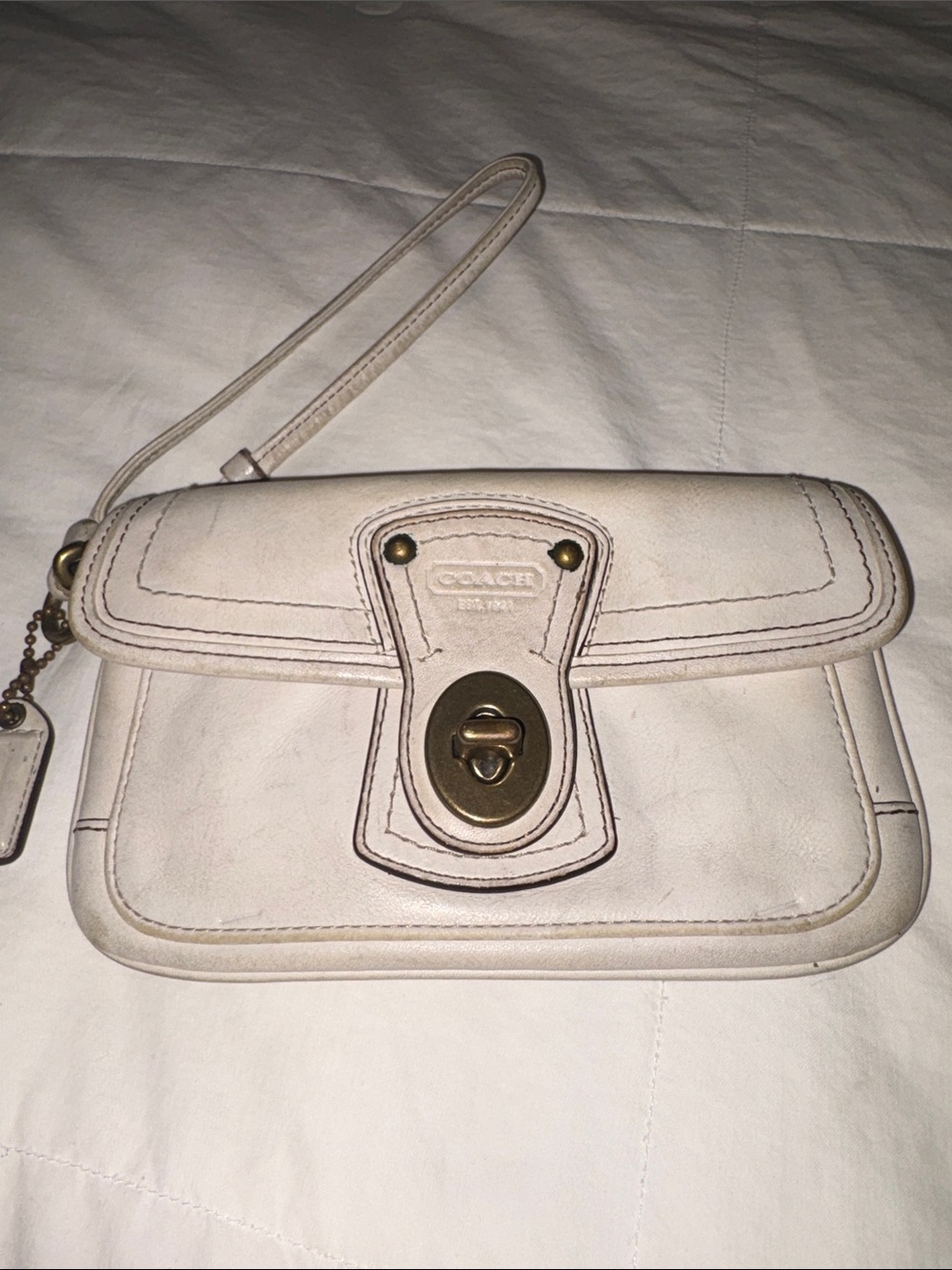 Coach Cream Leather Turn-Lock Wristlet Clutch